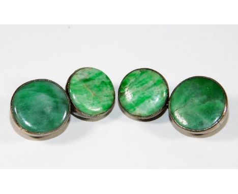 A pair of early 20thC. Chinese white metal jade cufflinks