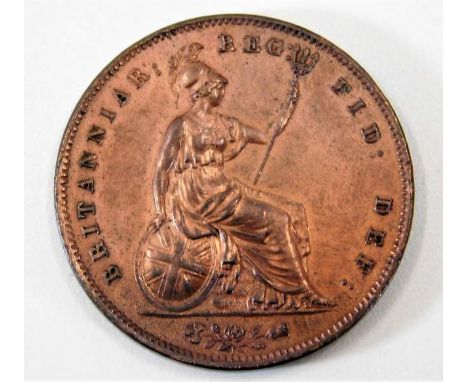 An 1854 penny with ornate trident UNC with lustre