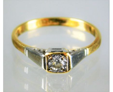 A small 18ct ring set with small diamond in white metal mount 2.1g size K