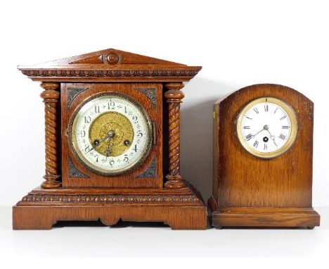 A c.1900 mantel clock with barley twist style columns & architectural pediment twinned with slightly later mantel clock