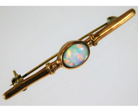 A yellow metal brooch with opal stone 2.2g