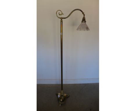 An early 20th century brass standard lamp with Hollophane shade - Height 167cm  - Tested