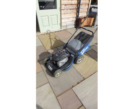 A MacAllister petrol driven lawn mower with a Briggs and Stratton 500 series 158cc engine 46hp 1.98kw - 45cm cut - in working