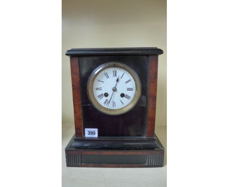 A 19th century 8 day chiming mantle clock in a faux marble wooden case - Height 28cm - working in the sale room