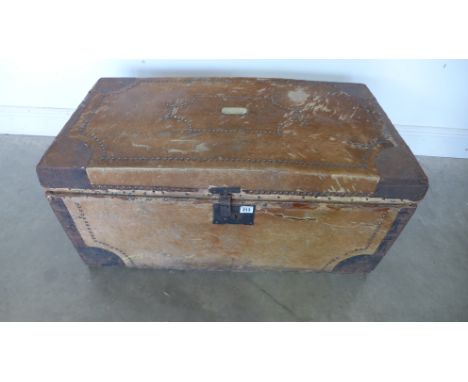 A hide covered trunk by James Craig and Co Saddler plaque to Miss Adamson, with assorted contents - 41cm x 90cm x 49cm