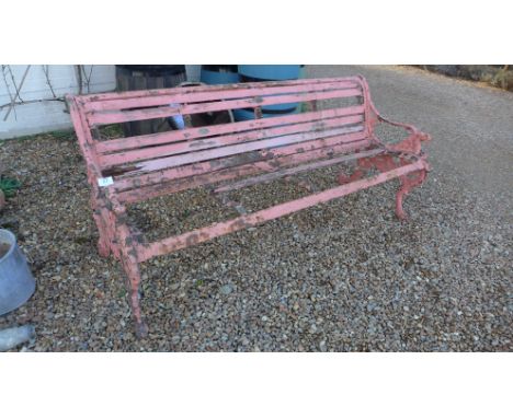 A Victorian cast iron park bench with dragon scroll arms - in need of restoration - Length 185cm x 82cm