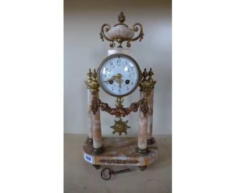 A French marble Portico clock - Height 31cm - with ormolu mounts - working in the sale room but missing bell