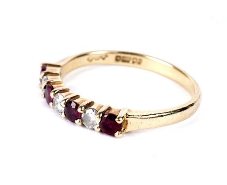 A ruby and diamond half eternity ring, in 18ct yellow gold, size M 1/2, 2.6g gross.