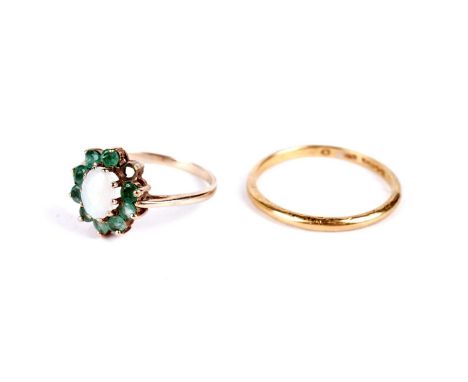 A 22ct yellow gold wedding band, size R 1/2, 2.4g gross; and an opal and emerald cluster ring, in 9ct yellow gold, size N, 1.