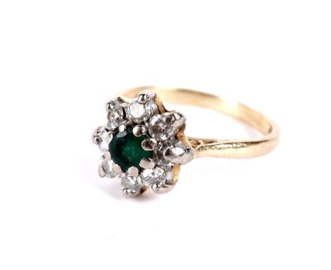 An emerald and diamond cluster ring, in white gold setting and 18ct yellow gold shank, size J 1/2, 3.5g gross.