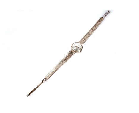 A Tissot 9ct yellow gold lady's manual wind cocktail watch, on 9ct gold bracelet strap, 15.0g gross.