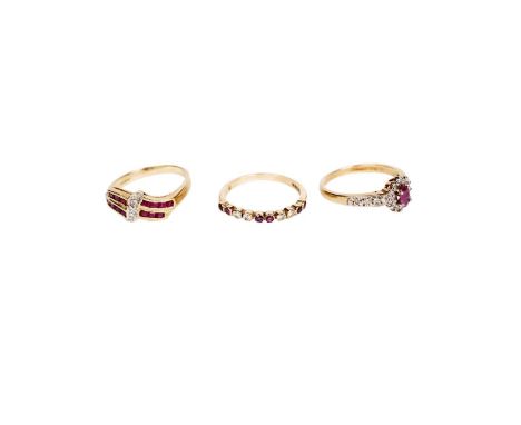 Three ruby and diamond rings, in 9ct yellow gold mounts and shanks, various sizes, 6.3g gross.