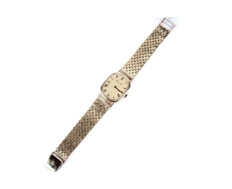A Reid &amp; Sons 9ct gold cased gentleman's manual wind wristwatch, the gilt Roman dial signed "Reid &amp; Sons", on 9ct yel