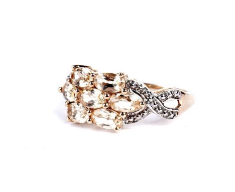 An Ouro Preto Imperial topaz dress ring, from the Jacque Christie Collection, set with oval cut topaz totalling approximately