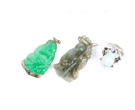 Three pieces of Chinese jade jewellery, comprising: a pendant carved as a figure (probably Buddha), in 14ct gold mount, 5.2cm