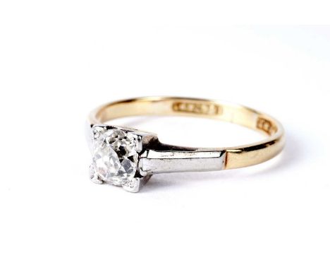 An old-cut solitaire diamond ring, the diamond weighing approximately 0.35 carats, in platinum setting and yellow gold shank,