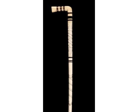 * Whalebone Stick. A Victorian whalebone stick, with two sections of spiral twist carving, plain marine ivory handle, and ros