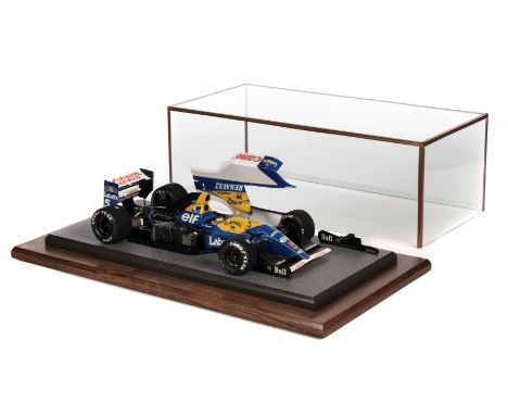 * Formula 1. A fine model of Williams FW14 driven by Nigel Mansell in the 1992 World Championship, professionally built to a 