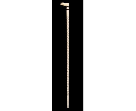 * Whalebone Stick. A Victorian whalebone stick, the stick carved with a spiral twist and marine ivory handle carved as a whal