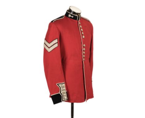 * Guards Uniforms. An E.II.R. 1959 pattern Guardsman scarlet tunic of the Welsh Guards, with white and black facings, staybri