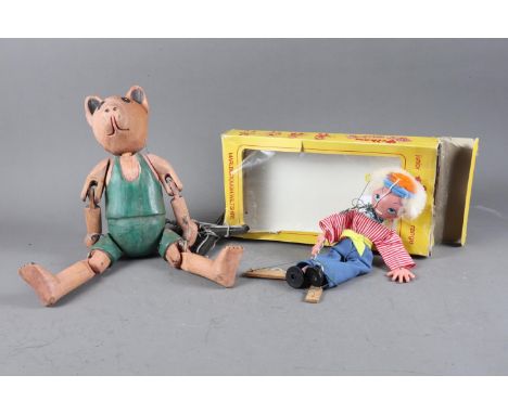 A Pelham Junior range JC2 "Boy" puppet, boxed, and a carved wood bear puppet, 14 1/2" high 