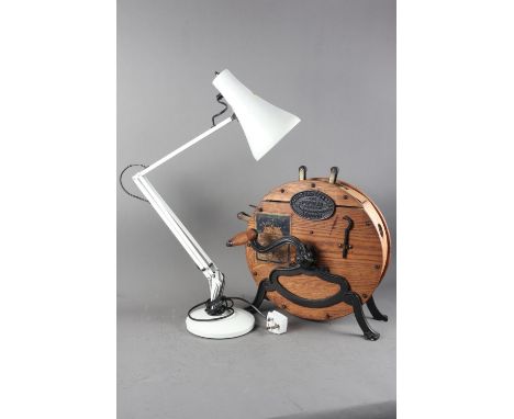 A white enamelled Anglepoise table lamp, on circular base, and an oak cased rotary knife cleaner, 16 1/2” high 