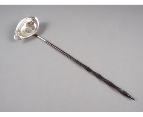 A Georgian silver toddy ladle with twisted whale bone handle, 14 3/4" long 