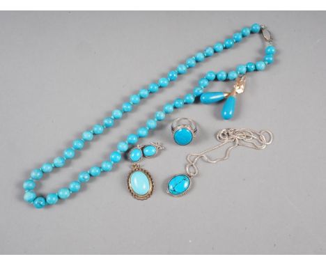 A pair of Egyptian gold and turquoise drop earrings, a yellow metal and turquoise pendant, a turquoise bead necklace, a silve