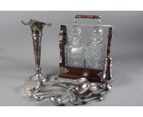 A Mappin &amp; Webb silver plate mounted two-bottle tantalus with two cut glass decanters and stoppers, a plated trumpet vase