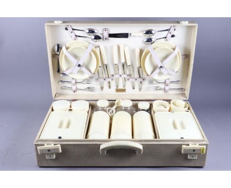 Two bagatelle boards, a dart board and a picnic set 