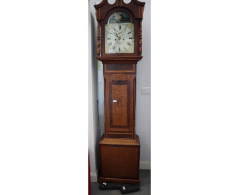 An early 19th century oak and mahogany banded long case clock with arch top dial and eight-day striking movement by C Hoyles 