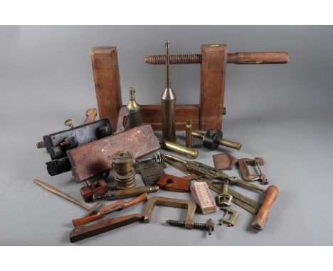 A carpenter’s large wood G-clamp, two smaller metal G-clamps, a number of moulding planes and various other vintage carpenter