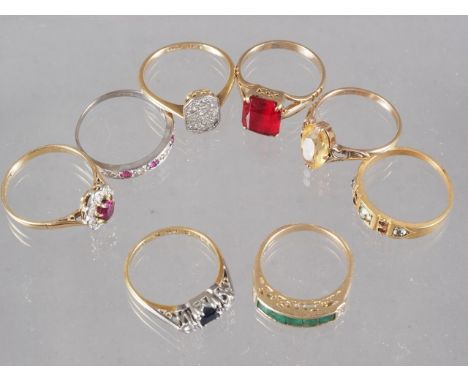A 14ct gold emerald and diamond dress ring, 2.8g, three 18ct gold rings, 7.5g, two 9ct gold rings, 4.7g, and two other yellow