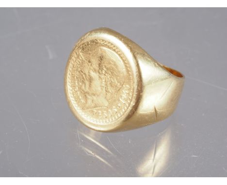 An 18ct gold ring set with a Mexican 2 1/2 Peso gold coin dated 1945, size I, 7.6g 