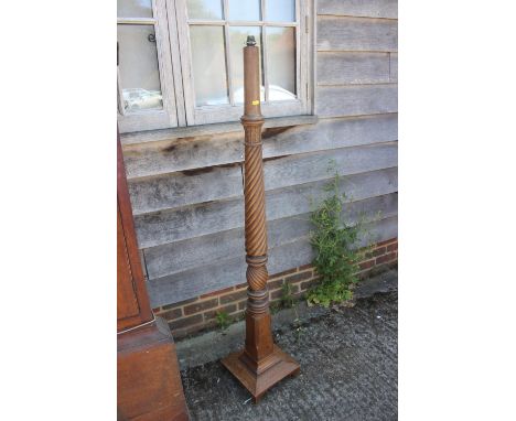 A Sheraton carved mahogany bedpost, now a standard lamp, on square base, 62" high 