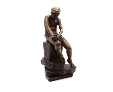 A Goldschieder painted terracotta figure, late 19th century, designed by Lemoine, ' the Arrow Carver', the figure of the boy 