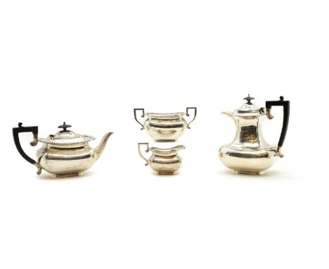 A silver four piece tea service by J&amp;T, Sheffield 1923, with gadrooned borders, the hot water pot 21cm high45ozt (4)Condi