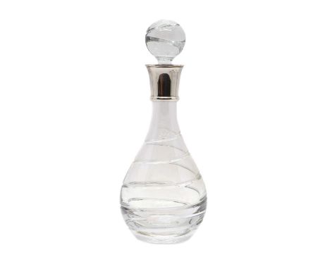 A silver mounted cut glass decanter the mounts by Carr's of Sheffield, Sheffield 2007, with spiral cut decoration,31.3cm high