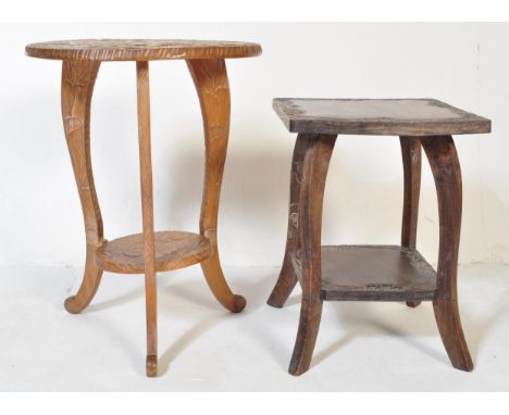 A pair of 20th century carved hardwood occasional side&nbsp; / lamp tables. The tables consist of two tiers, carved foliate a