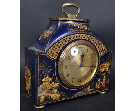 A early 20th Century Chinoiserie decorated mantel clock. With brass gilt chapter ring ebonised numbers. Blue ground with gilt