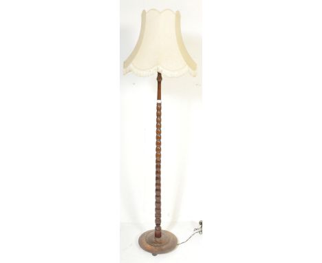 1920's oak William &amp; Mary revival mahogany floor standard - standing lamp. Terraced base with tall bobbin carved column r