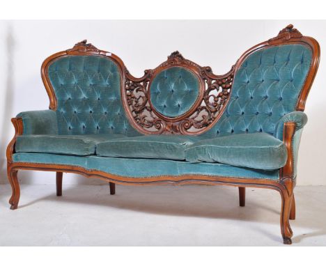 A 20th century French Louis XV canape sofa settee. The canape having carved show wood frame with cushioned elbow rests raised