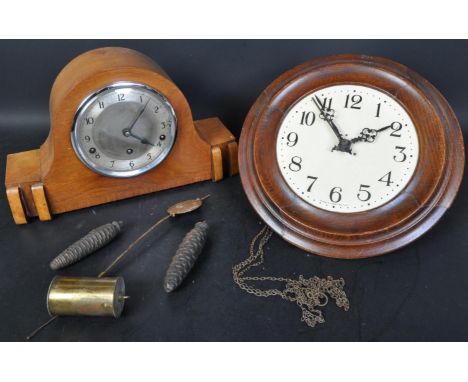 A Victorian 19th century oak post office clock having Arabic numerals to the chapter ring with cathedral hands, together with