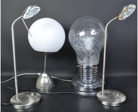 A collection of modern lighting to include guzzini type lamp, lightbulb shaped lamp and others to include pair of silver beds