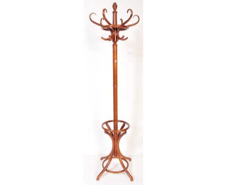 A retro vintage mid 20th Century bentwood coat stand / hat rack in the manner of Thonet. Having a tapering finial top, six sc