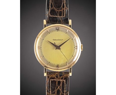 A GENTLEMAN'S 18K SOLID ROSE GOLD JAEGER LECOULTRE WRIST WATCHCIRCA 1950, WITH ROSE GOLD MARKERS & DAUPHINE HANDSMovement: Ma