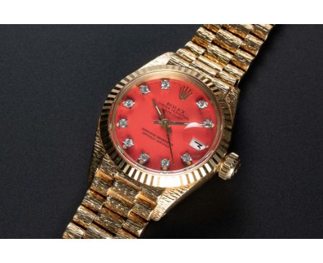 A RARE LADIES 18K SOLID GOLD ROLEX OYSTER PERPETUAL DATEJUST BRACELET WATCHCIRCA 1973, REF. 6917 WITH ORIGINAL "CORAL RED" "S