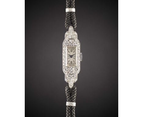 A FINE LADIES PLATINUM & DIAMOND PATEK PHILIPPE COCKTAIL WRIST WATCHCIRCA 1930sMovement: Manual wind, signed Patek Philippe &