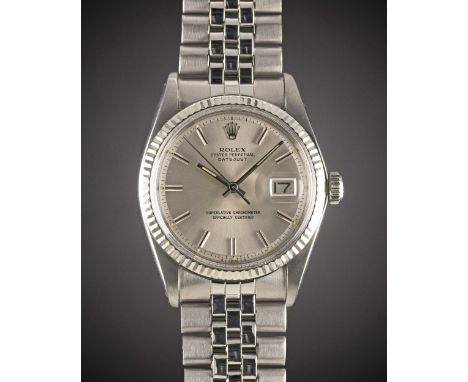 A GENTLEMAN'S STEEL & WHITE GOLD ROLEX OYSTER PERPETUAL DATEJUST BRACELET WATCHCIRCA 1975, REF. 1601 WITH SILVER SIGMA DIALMo
