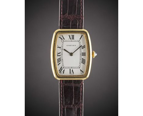 A GENTLEMAN'S SIZE 18K SOLID GOLD CARTIER PARIS "FABERGE TONNEAU" WRIST WATCHCIRCA 1980Movement: 17J, manual wind, cal. 2512,